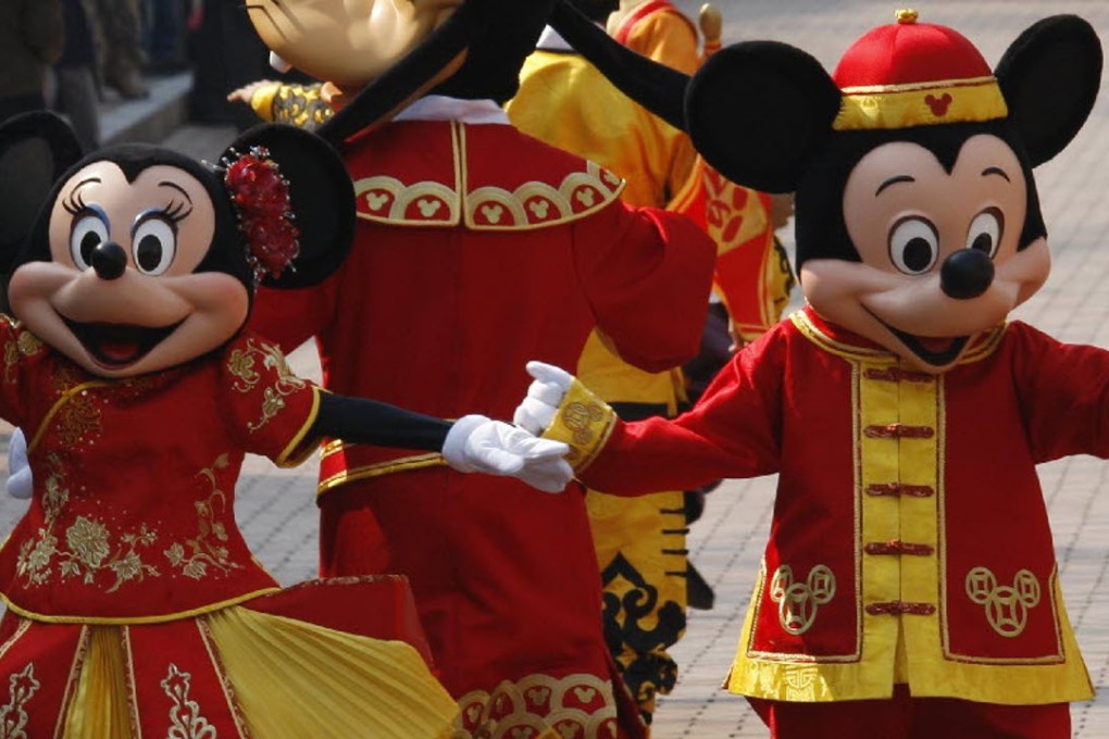 Minnie and Mickey Mouse at Hong Kong Disneyland. Photos: Reuters