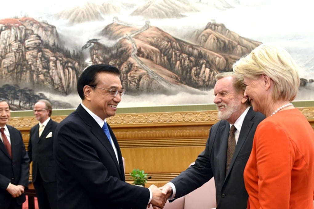 Last February, Premier Li Keqiang told foreign nationals in China that Beijing would make it easier for them to apply for permanent residency. File photo