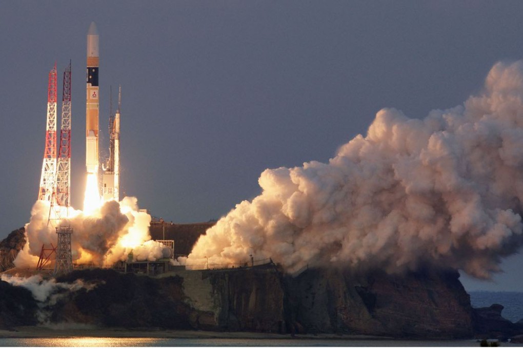 An H-2A rocket carrying an X-ray astronomy satellite is launched from the Tanegashima Space Centre in Kagoshima Prefecture, southwestern Japan. Photo: Kyodo