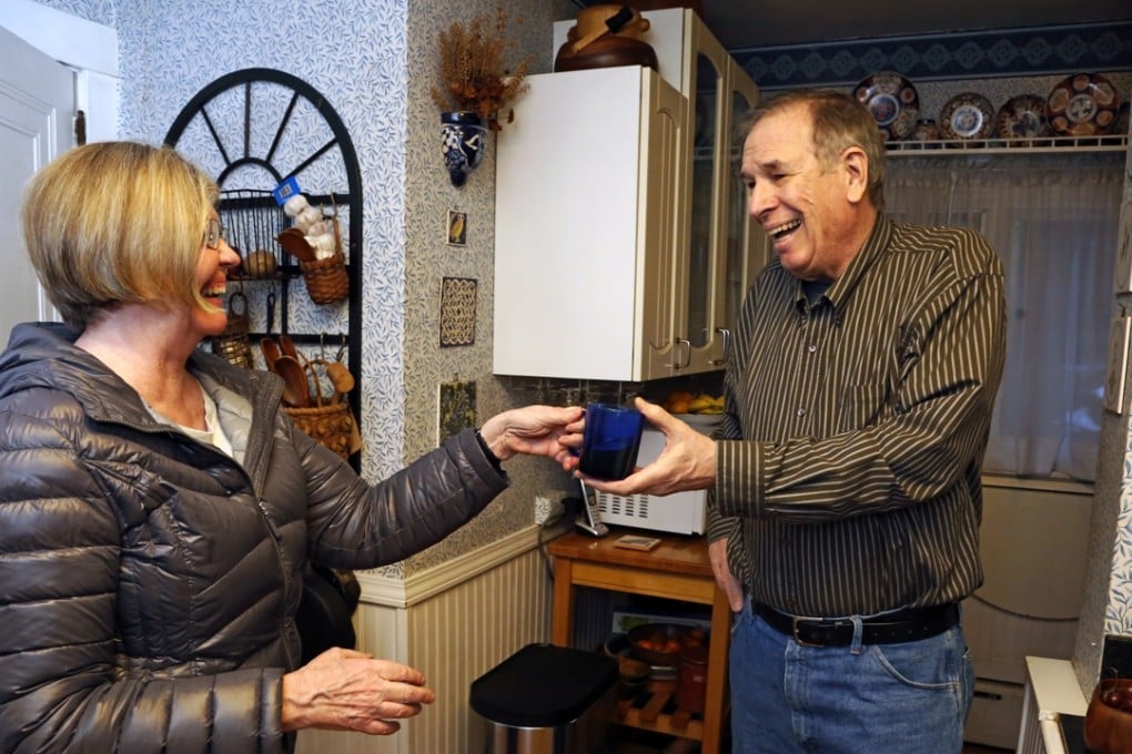Dave Bostick and wife Carol share a laugh in the kitchen of their home in Pittsburgh on Tuesday. Bostick, 71, a retired vocational rehab counselor, said his low mood and energy level improved “a little bit” during a testosterone treatment study but suddenly worsened afterward. Photo: AP