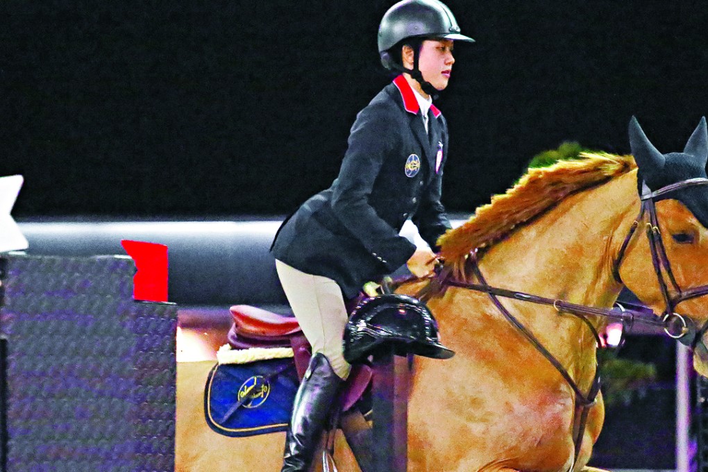 Hong Kong’s Jacqueline Lai takes part in a practice session for the Longines Masters showjumping event at AsiaWorld-Expo. Photos: Nora Tam