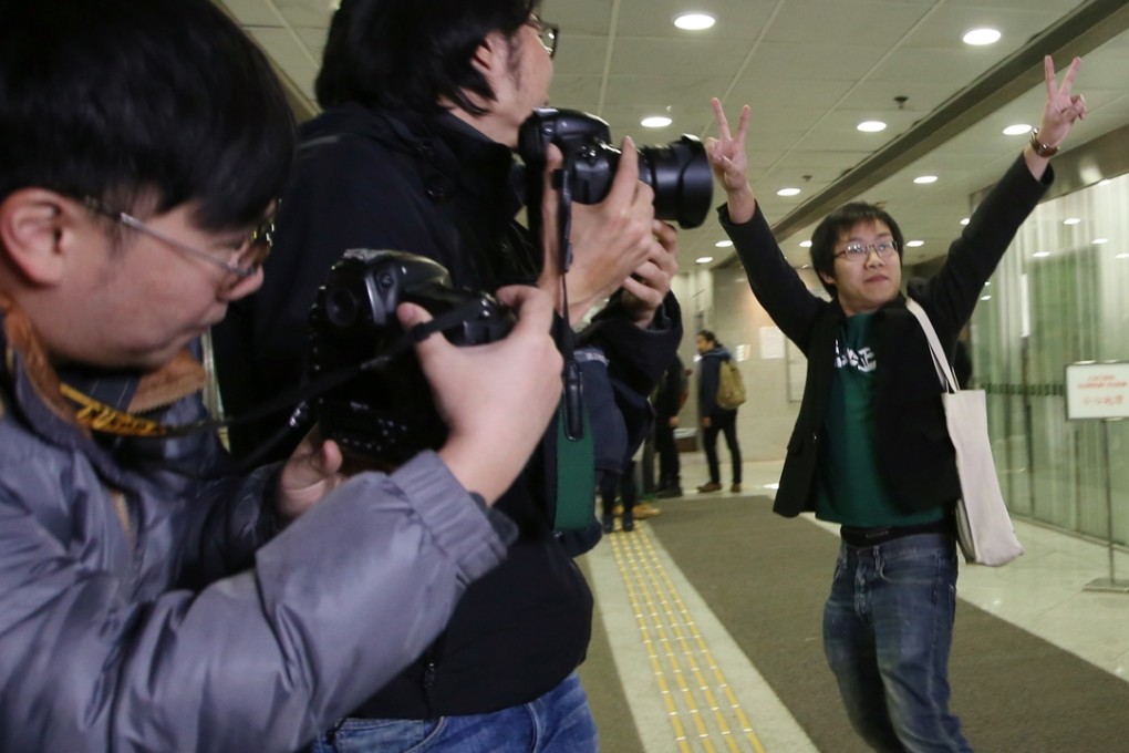 Activist Raphael Wong outside Eastern Court. Photo: Sam Tsang