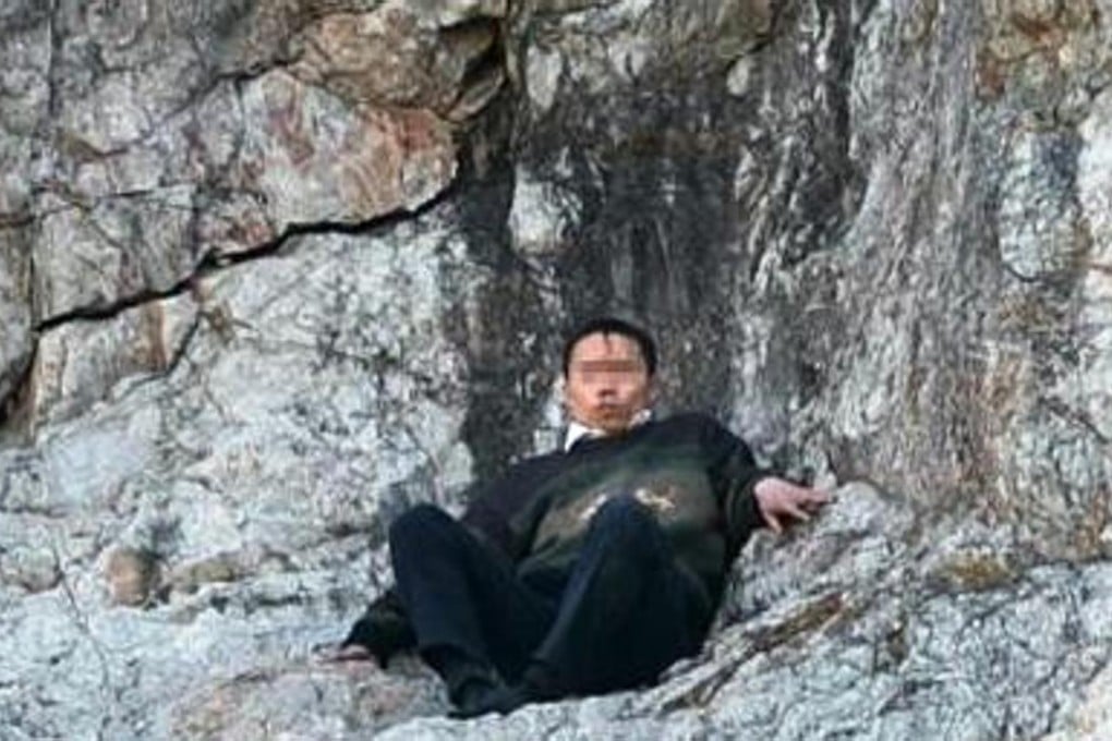 The man, who was not named, spent five hours trapped 60m up a cliff. Photo: China.news