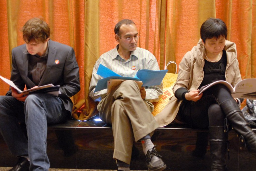 Applicants at a job fair in Beijing. The government has gradually expanded eligibility for permanent residency. Photo: SCMP Pictures