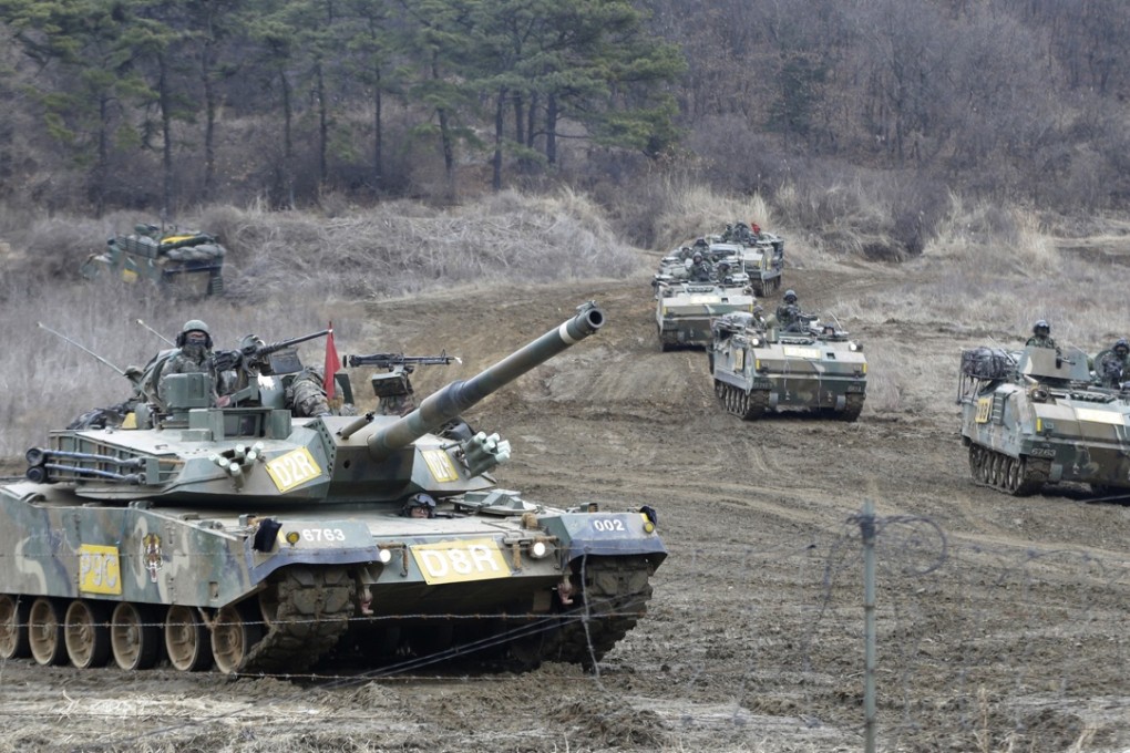 South Korean army's armored vehicles conduct the annual exercise in Paju, near the border with North Korea. Photo: AP