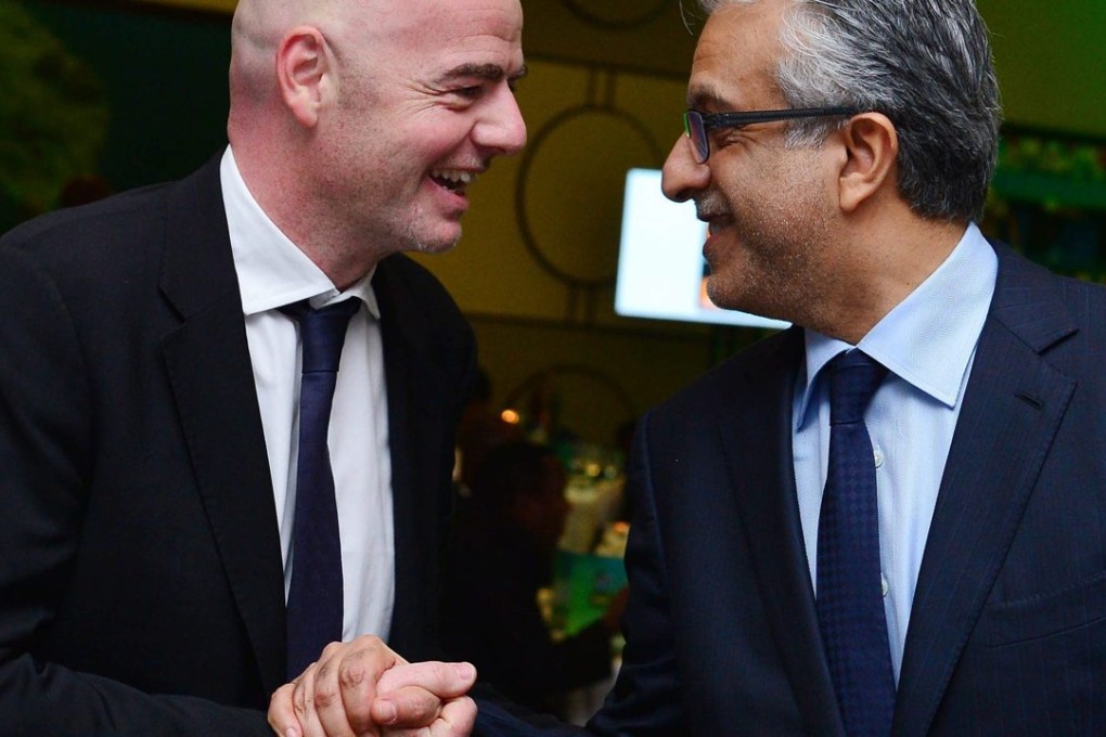 Fifa presidential candidates Gianni Infantino (left) and Sheikh Salman Al Khalifa share a joke at a CAF meeting in Rwanda in February. Neither seem a massive upgrade on Sepp Blatter. Photo: EPA