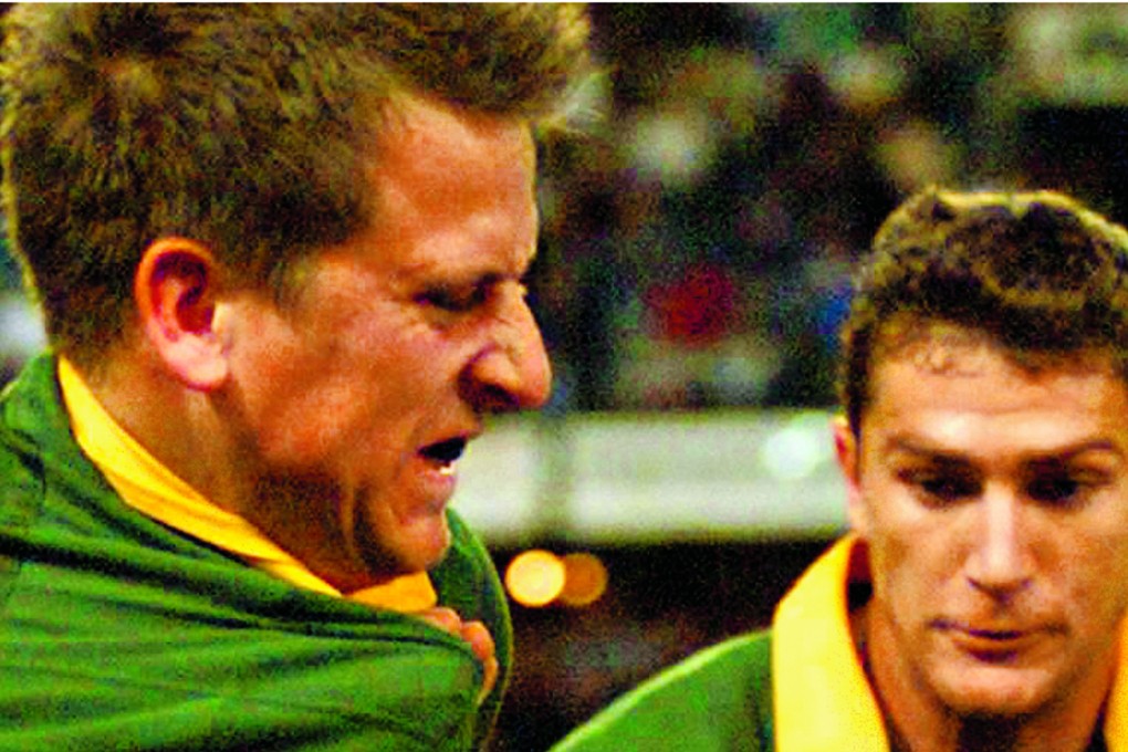 Robbie Fleck (left) in action for South Africa back in 1999. Photo: AFP