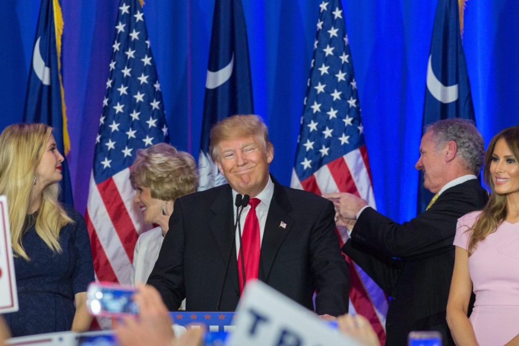 Republican presidential candidate Donald Trump celebrates with supporters along with his wife Melania and daughter Ivanka after his victory in the South Carolina Republican primary. Photo: EPA