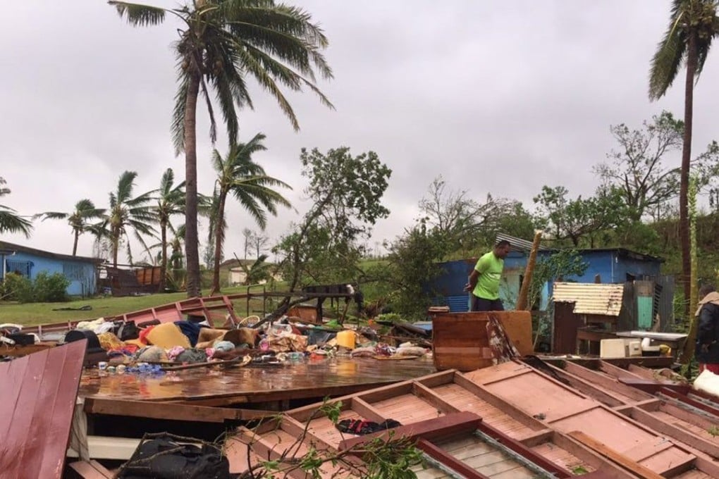 Scenes of Tropical Cyclone Winston's destruction in Ba, Fiji. Authorities were urging people to remain indoors as they cleared fallen trees and power lines. They said all schools would be closed for a week to allow time for the cleanup. Photo: EPA