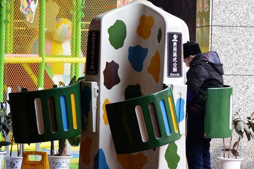 Two sets of four open-air urinals with only small green plastic doors have been built in the Chinese city of Chongqing. Photo: Tencent