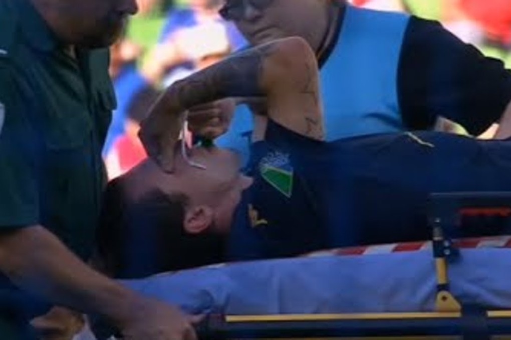 Storm Roux is stretchered off