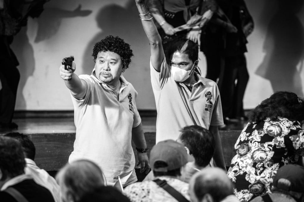 Two low-ranking gangster characters are hired to stage an attack in a plot to push for national security legislation in a scene from Extras, one of five segments in the omnibus film Ten Years. Photo: Andy Wong
