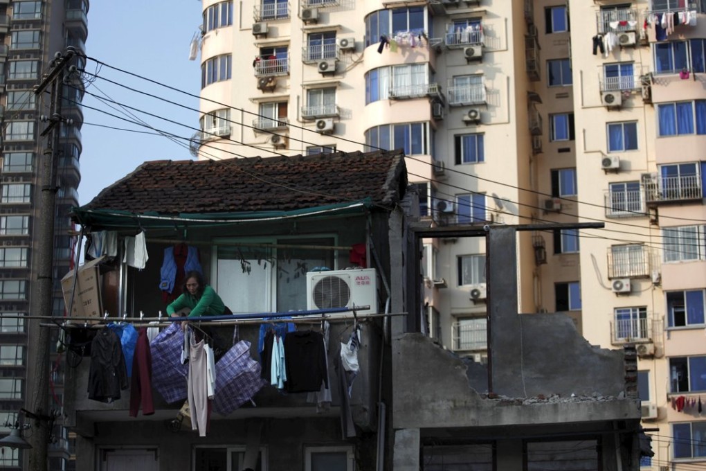 A Shanghai house facing demolition to make way for new apartments. Photo: Reuters
