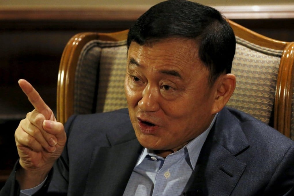Former Thai Prime Minister Thaksin Shinawatra speaks during an interview in Singapore February 23, 2016. Photo: Reuters