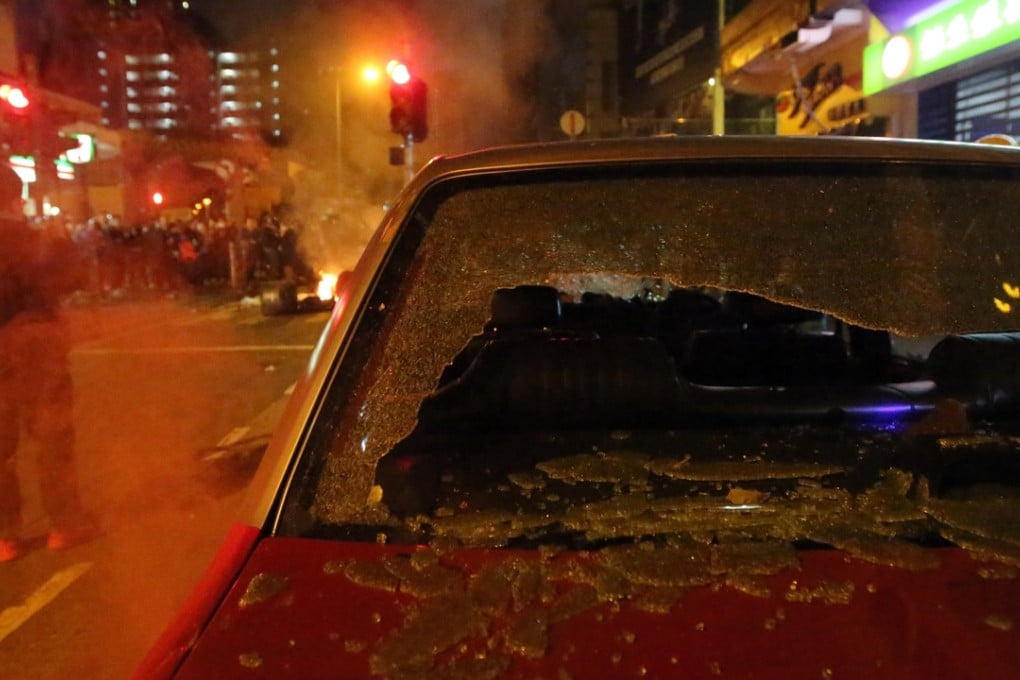 A taxi’s smashed windscreen during the Mong Kok riot at the start of the Lunar New Year holiday. Photo: Edward Wong