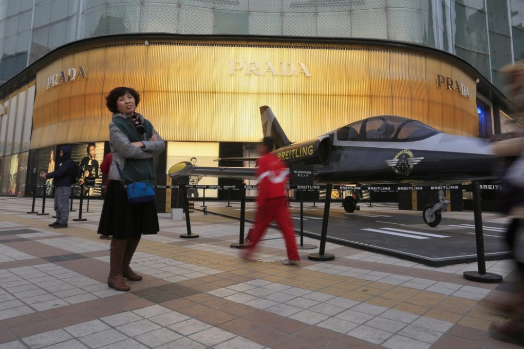 Many economists believe China should cut investment to make room for consumption. But, in fact, investment provides critical support for consumption. Photo: EPA
