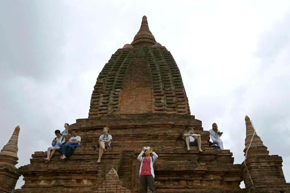 Tourists flock to watch the sunrise at an ancient pagoda in Bagan city, Myanmar. Photo: EPA