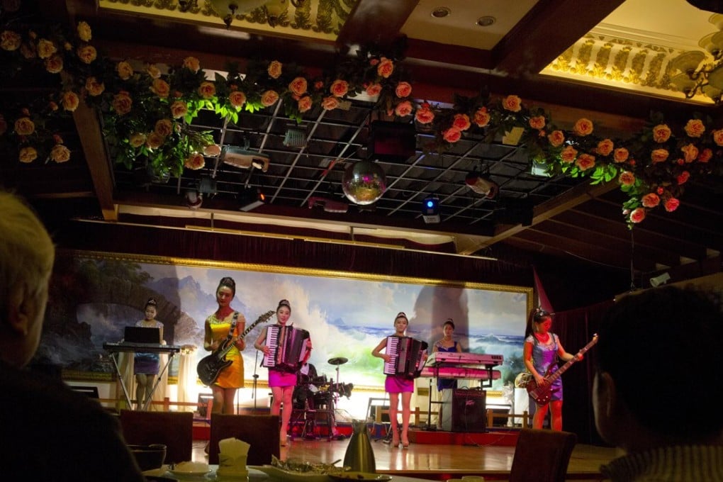 North Korean performers entertain customers at the Okryugwan restaurant in Beijing. Photo: AP