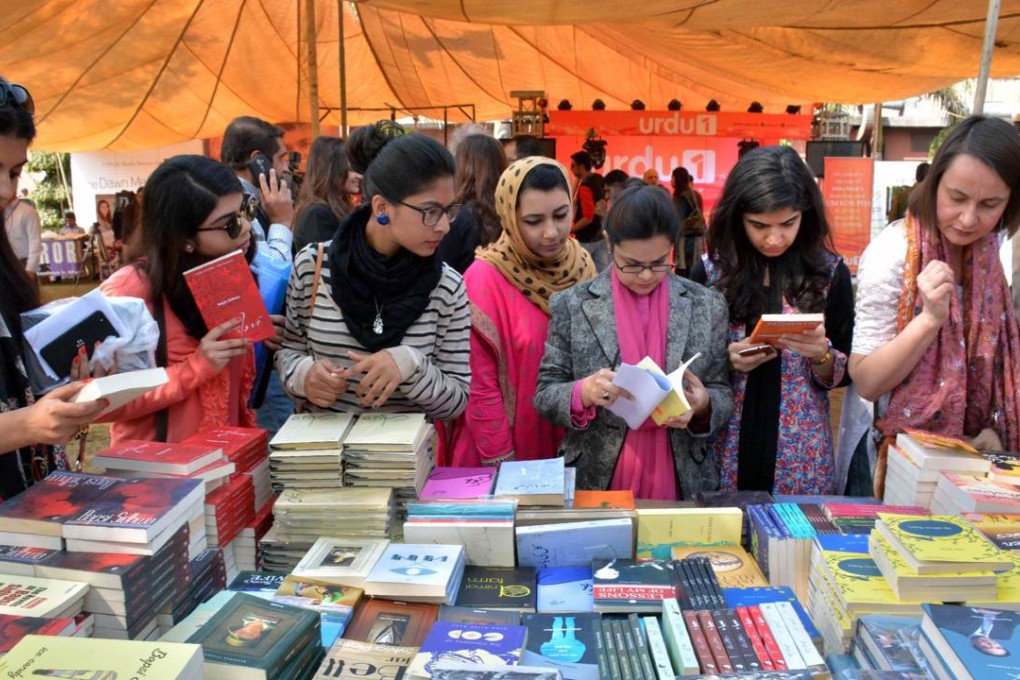 Pakistani women browse books at the Lahore Literary Festival. Photos: Ahmed Riaz