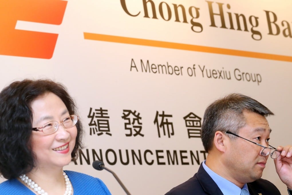 Chong Hing Bank vice-chairman Margaret Leung and chairman Zhang Zhaoxing at its results announcement on Wednesday. Photo: David Wong