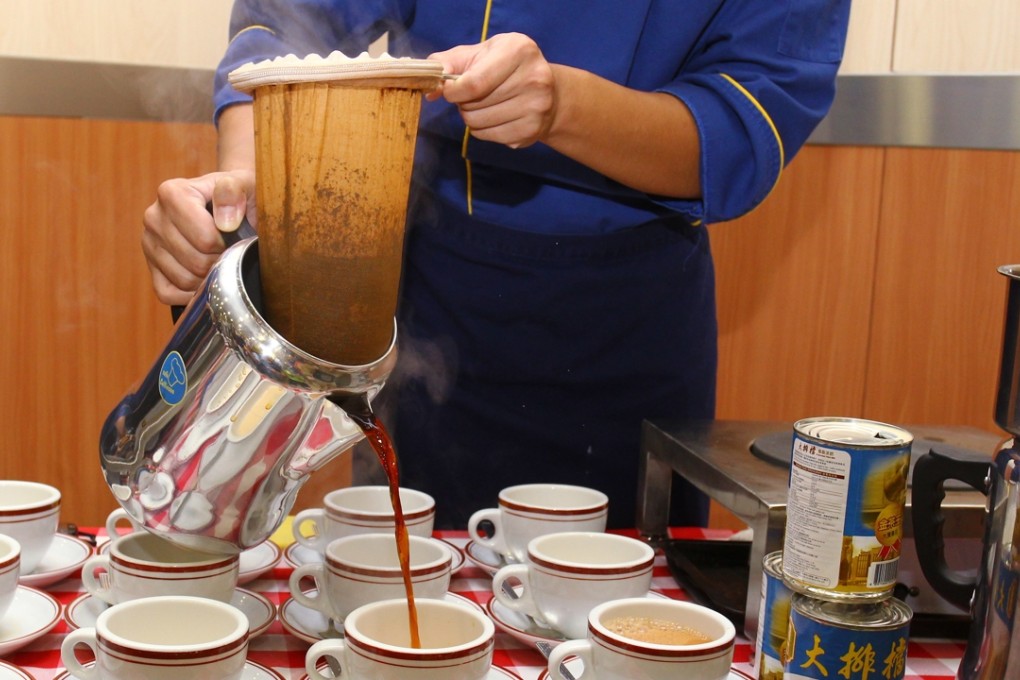 A young inmate at Cape Collinson making Hong Kong-style milk tea. Photo: May Tse