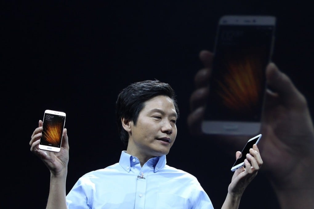 Xiaomi CEO Lei Jun unveils the new Mi 5 at an event in Beijing today. The phone was also showcased at the Mobile World Congress in Barcelona. Photo: Simon Song