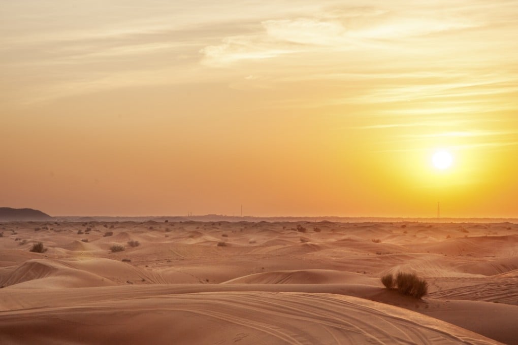 Sunset in the desert. Alwyn Hamilton’s debut novel is a Western transported to the sandy wastes. Photo: Shutterstock