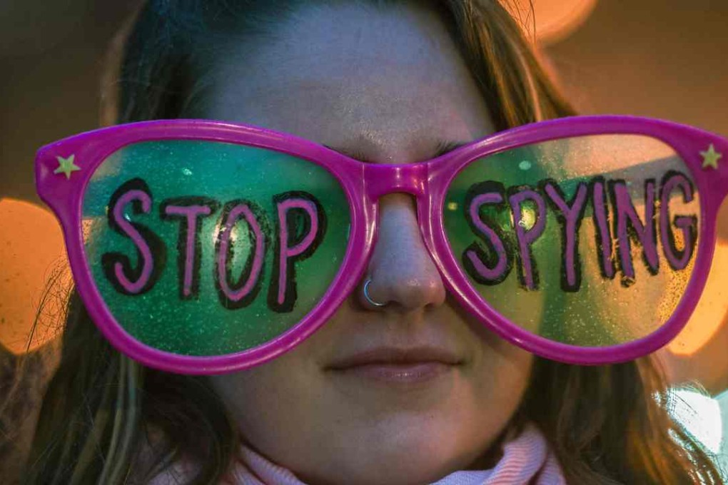 A protester outside the FBI headquarters in Washington, DC. Photo: AFP