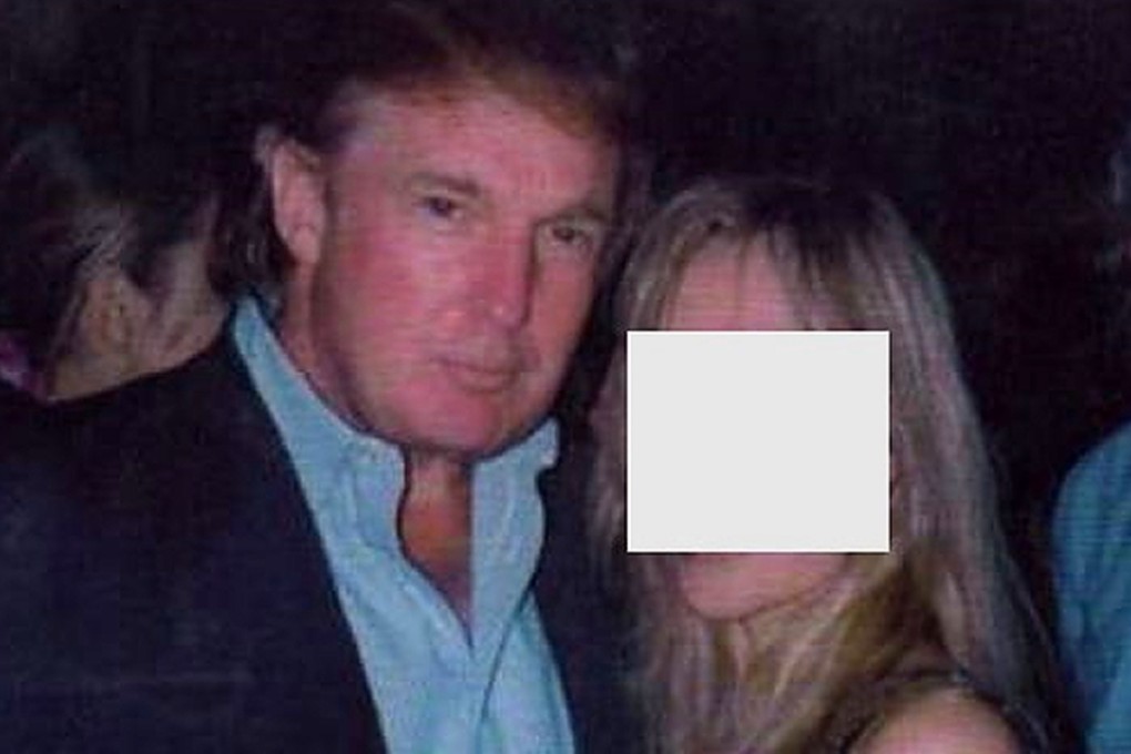 Donald Trump, pictured in the 1990s with a woman who accused him of sexually assaulting her and trying to rape her in 1993 . The image was posted by the woman to her website. Photo: SCMP Picture