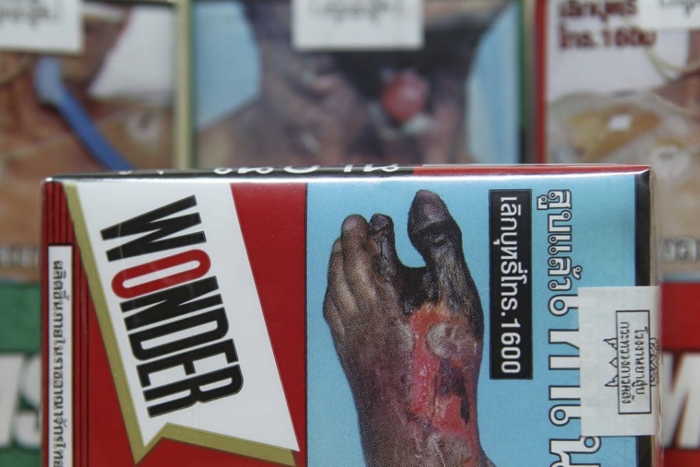 Cheaper cigarettes are planned to prevent smokers damaging their health smoking poor quality brands. Photo: AP
