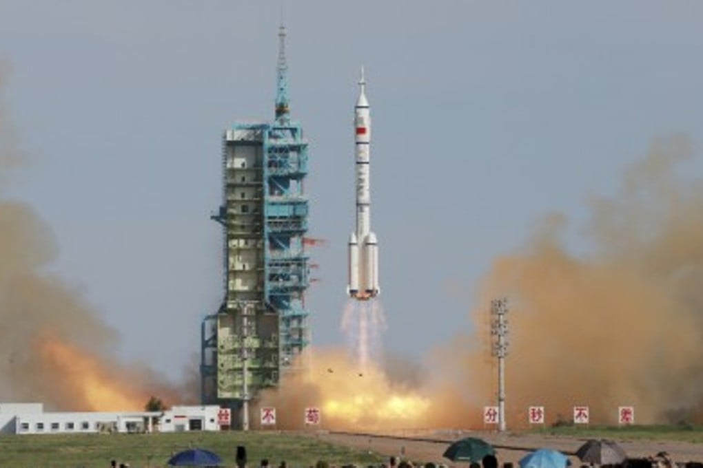 Three Chinese astronauts blasted off in a rocket in 2013 at the start of a 15-day mission to dock with the nation’s experimental space laboratory. Photo: Xinhua.