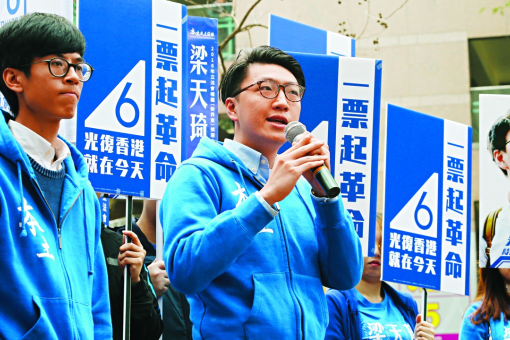 New Territories East by-election candidate Edward Leung (right) at a rally in Sheung Shui. Photo: Felix Wong