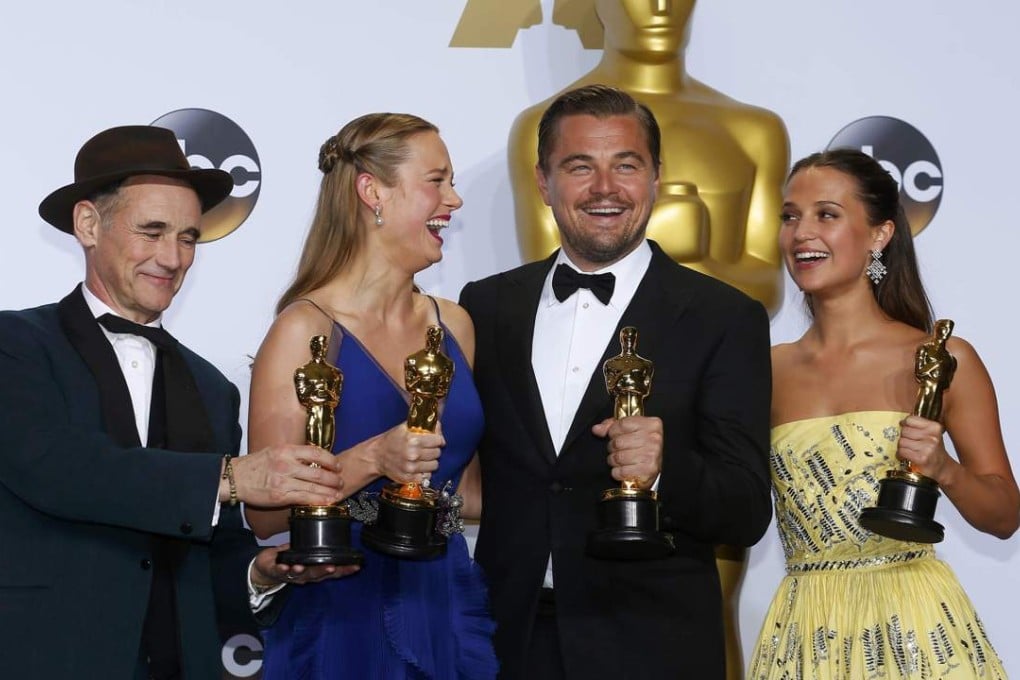 Best supporting actor Mark Rylance, best actress Brie Larson, best actor Leonardo DiCaprio and best supporting actress Alicia Vikander pose with their Oscars backstage at the 88th Academy Awards in Hollywood. Photo: Reuters