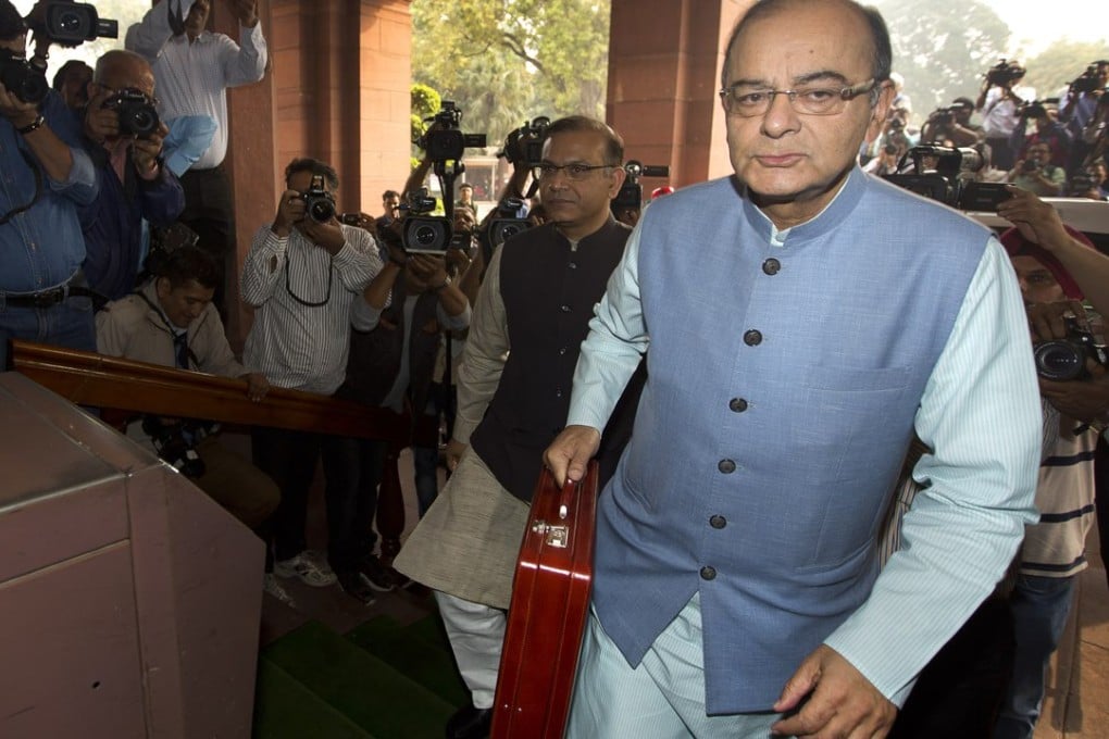 Indian Finance Minister Arun Jaitley arrives at parliament house to present the federal budget 2016-17, in New Delhi. Photo: AP