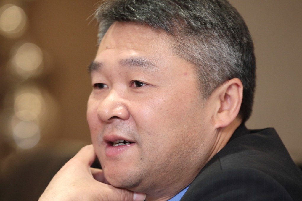 Yuexiu Property chairman Zhang Zhaoxing says he expects the company’s gross profit margin to remain stable in the next two years as the government is supporting the sector. Photo: Thomas Yau