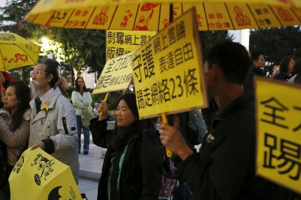 Pro-democracy protesters chant slogans against a copyright amendment bill, which they say will restrict freedom of expression. Photo: Reuters