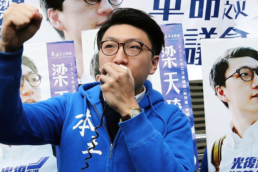 Edward Leung Tin-kei, who finished a respectable third, canvassing before the poll. Photo: Edward Wong