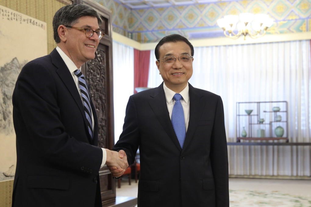US Secretary of the Treasury Jacob Lew shakes hands with Chinese Premier Li Keqiang in Beijing on Monday. Photo: AP