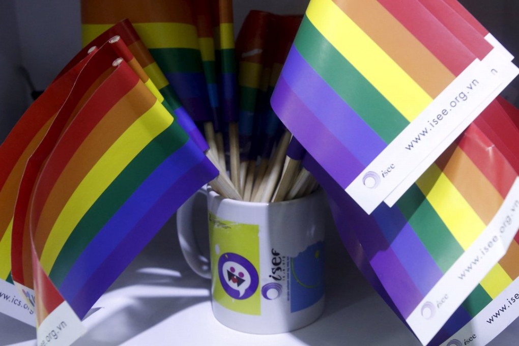 Gay rainbow flags are seen during a meeting of gay people in Hanoi. Photo: Reuters