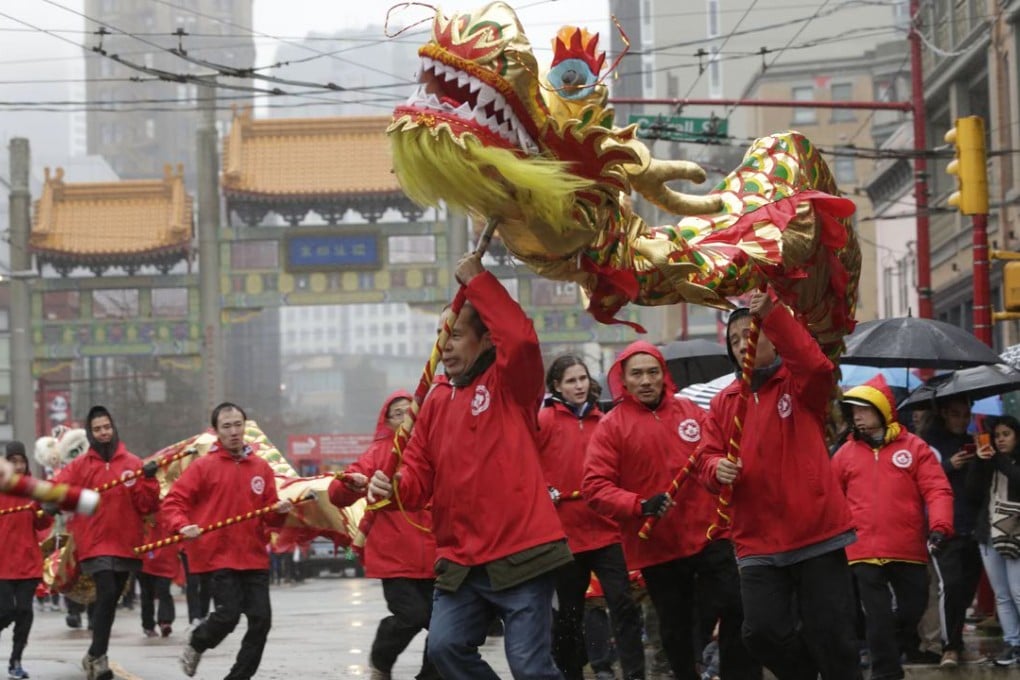 Dragon dancers perform during a Chinese New Year Parade through Vancouver’s Chinatown on February 16. Photo: Xinhua