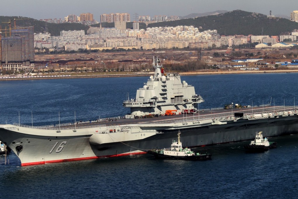 The Liaoning, China's first aircraft carrier, returns to port after its first navy sea trial in Dalian in northeastern China's Liaoning province in 2012. Photo: AP