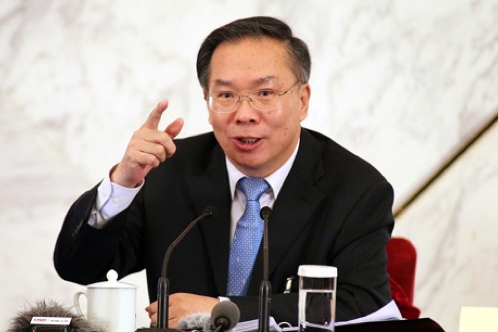 Wang Guoqing addresses the media at a press conference at the Great Hall of the People. He said there was “no problem” of a hard landing.