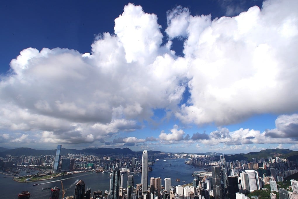 Clouds over Victoria Harbour, photographed from The Peak. Photo: David Wong