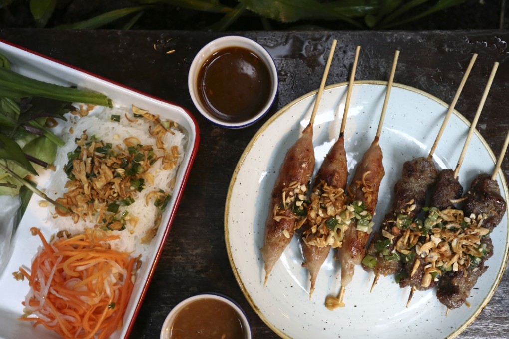 Pork meatball and Mayura Wagyu beef skewers with condiments from Le Garcon Saigon. Photos: Jonathan Wong