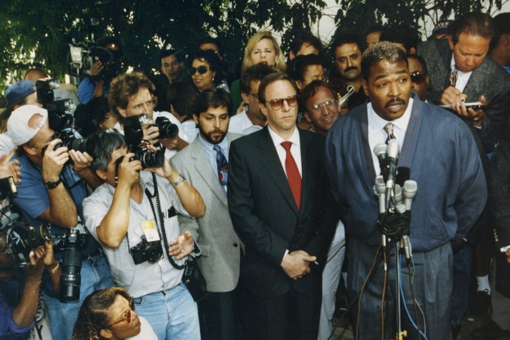 Rodney King meets the press outside his lawyer's office in Beverly Hills in 1992, famously pleading “can we all get along” amid the killing, looting and destruction that followed the acquittal of officers charged with his beating. Photo: Tribune News Service
