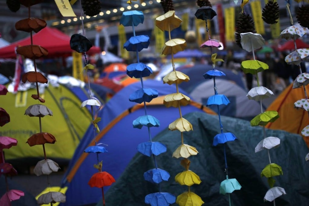 Rows of handmade paper umbrellas, a symbol of the Occupy Central civil disobedience campaign in 2014, hang at the protest site in Admiralty. Photo: EPA