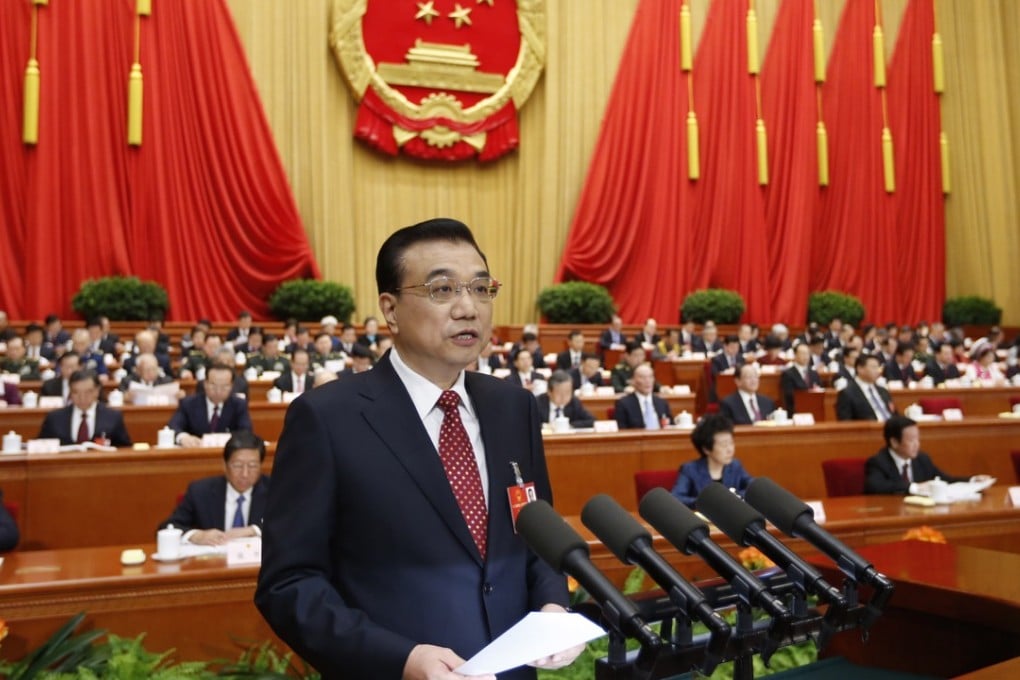China’s Premier Li Keqiang delivers his government work report during the opening meeting of the fourth session of the National People's Congress at the Great Hall of the People in Beijing on Saturday. Photo: Xinhua