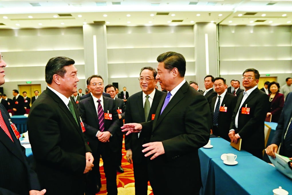 Chinese President Xi Jinping joins a panel discussion of political advisers from the China Democratic National Construction Association and the All-China Federation of Industry and Commerce during the ongoing annual session of the country's top political advisory body in Beijing. Photo: Xinhua