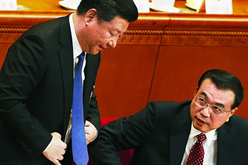 President Xi Jinping and Li Keqiang after the premier delivered his work report to delegates at the National People's Congress in Beijing yesterday. Photo: EPA
