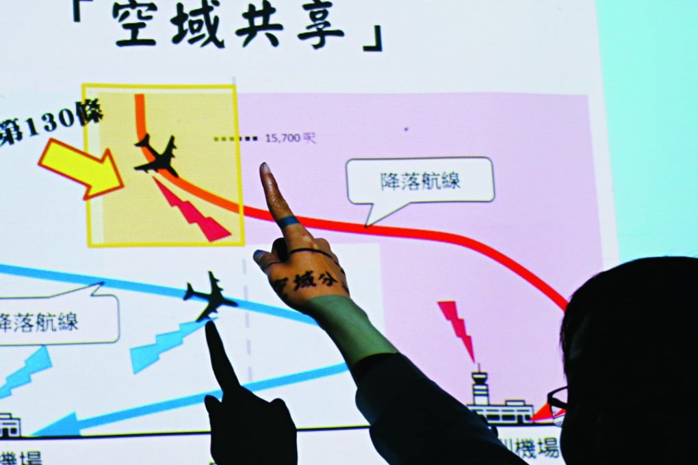 Roy Tam Hoi-pong of Green Sense points out the findings of the joint airspace study. Photo: Nora Tam